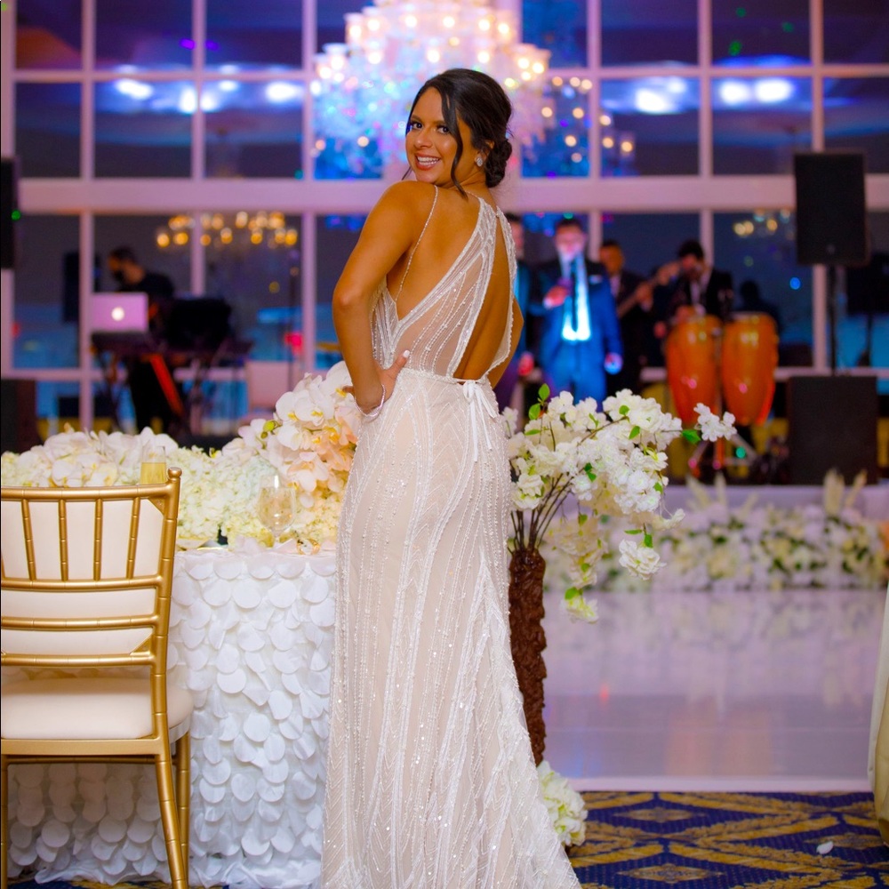 Beautiful beaded gown perfect for any elegant occasion- prom, wedding or gala
